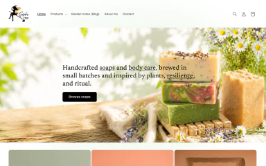 Garden Hoe Soaps homepage with handcrafted soap, flowers, and site navigation